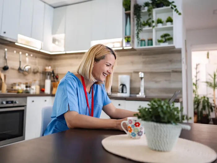 An operator reviewing compliance costs at their desk
